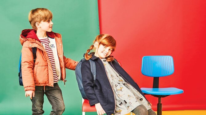 Boy and girl in designer clothes