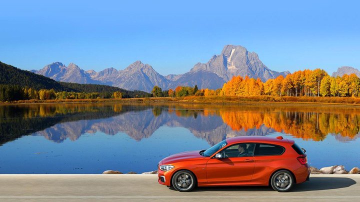 Auto Europe hire car in front of lake in Europe