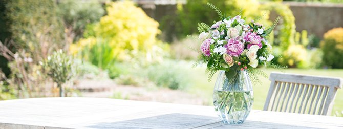 Flower bouquet on garden table