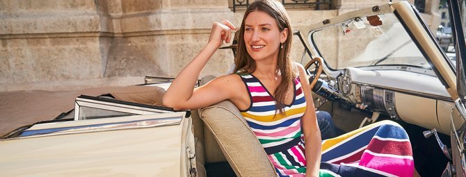 Woman wearing Boden stripy dress in car