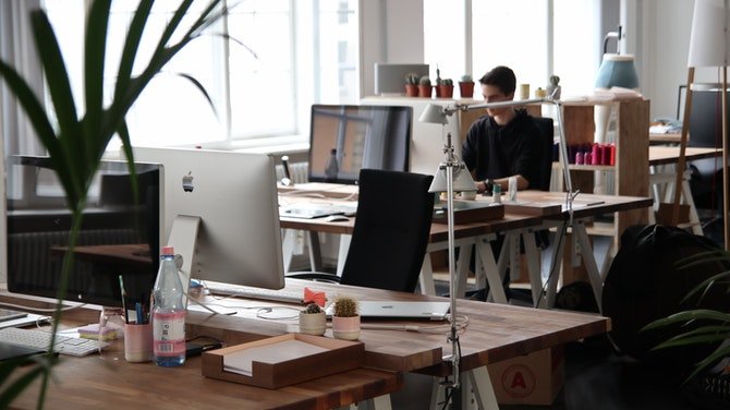 Office with laptops and desks