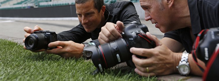 Men using Canon cameras