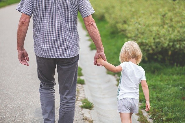 father and daughter walking together