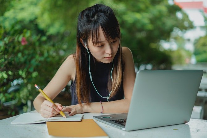 Woman learning on laptop