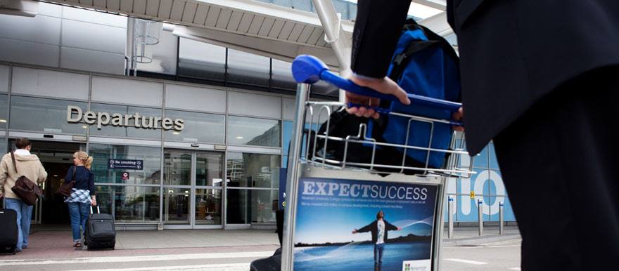 Person walking into Gatwick Airport