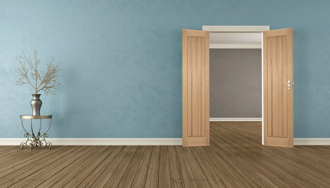 Green Tree Doors discount code banner - wooden door in house