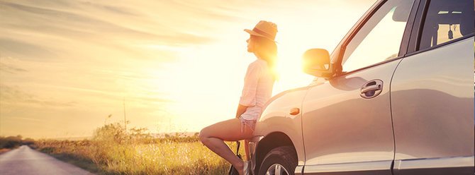 Hertz discount codes banner - woman standing by car