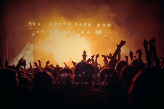 Impericon discount codes banner - people in gig crowd