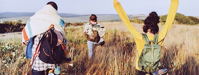 People wearing Jack Wills clothes in sunny wheat field