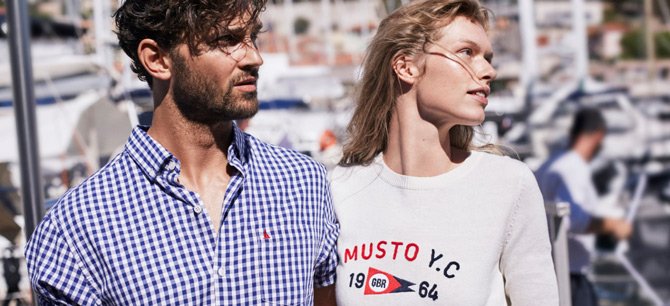 Woman and man wearing Musto sailing gear