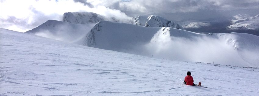 mountain ski slopes covered in snow