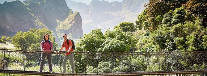 Two people exploring the jungle