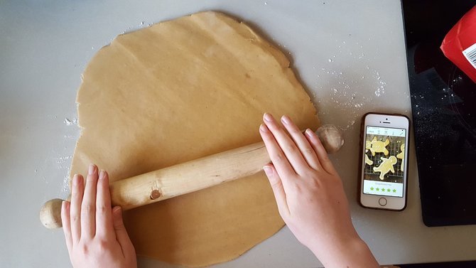 Woman rolling dough