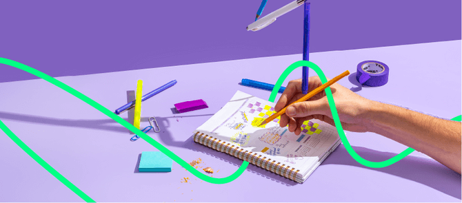 Skillshare banner person writing in notebook
