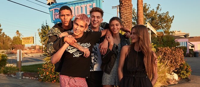 Superdry discount code and models in tees and denim
