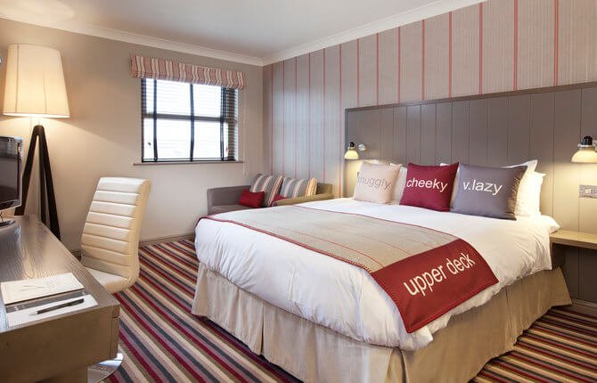 Village Hotels hotel room with double bed