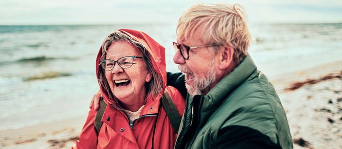 YHA banner two people on the beach